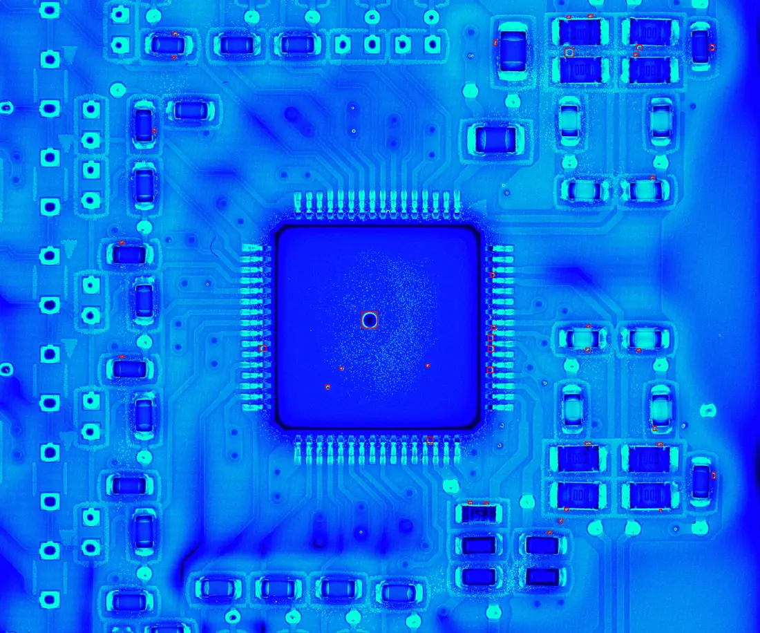 Densely populated board imaged under UV inspection lighting